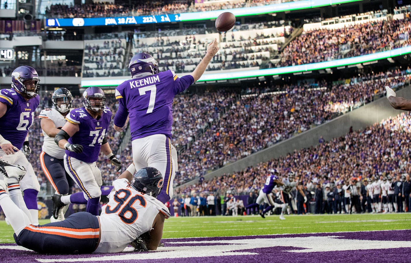 Vikings quarterback Case Keenum was pressured by the Bears' Akiem Hicks (96) in the fourth quarter Sunday.