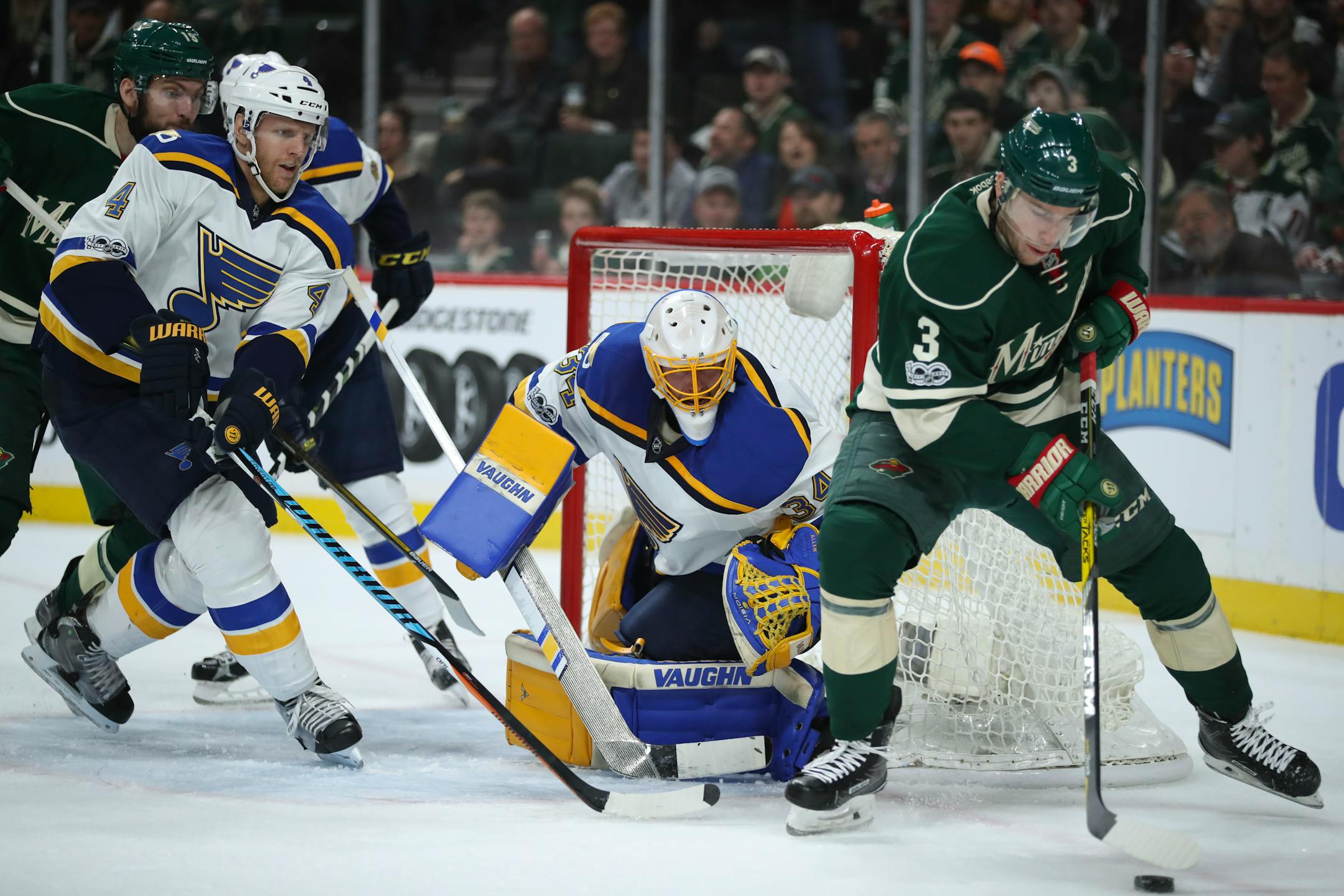 Minnesota Wild center Charlie Coyle (3) tried to get in position to get a shot off on St. Louis Blues goalie Jake Allen (34) in the second period.