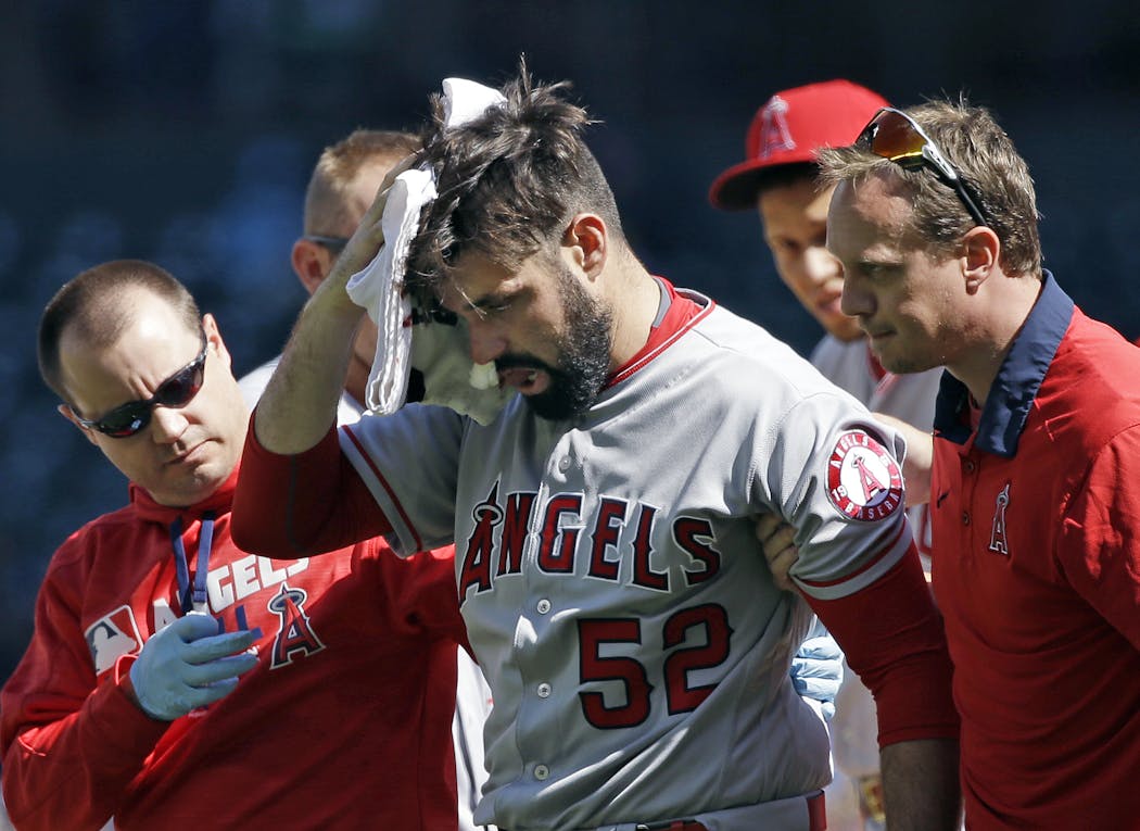Matt Shoemaker, pitching for the Angels, left the field after being hit by a line drive on Sept. 4, 2016.