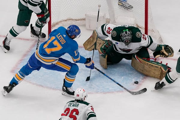 St. Louis Blues' Josh Leivo (17) is unable to score past Minnesota Wild goaltender Marc-Andre Fleury (29) during the third period of an NHL hockey gam
