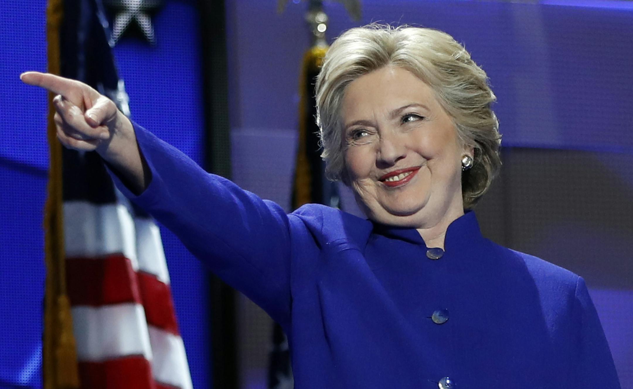 Democratic Presidential candidate Hillary Clinton appears to join President Barack Obama during the third day session of the Democratic National Convention in Philadelphia, Wednesday, July 27, 2016. (AP Photo/Carolyn Kaster)