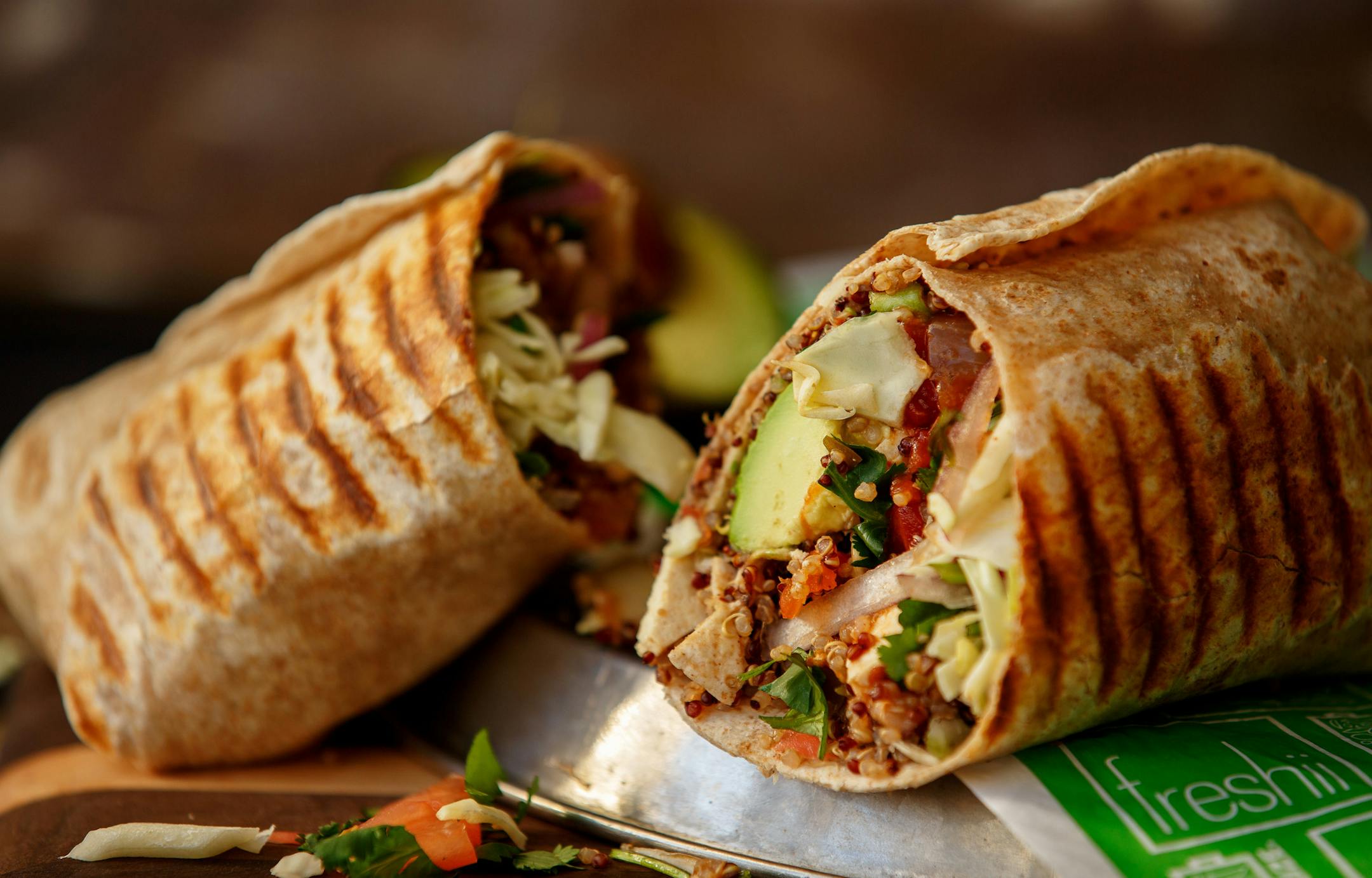 The photo is provided by Freshii. Budget ID is 685085 Caption: Freshii restaurants will discount its Mexican-inspired entrees 50 percent on Monday in response to Chipotle being closed several hours for health and safety training of its employees. Baha burrito in photo.