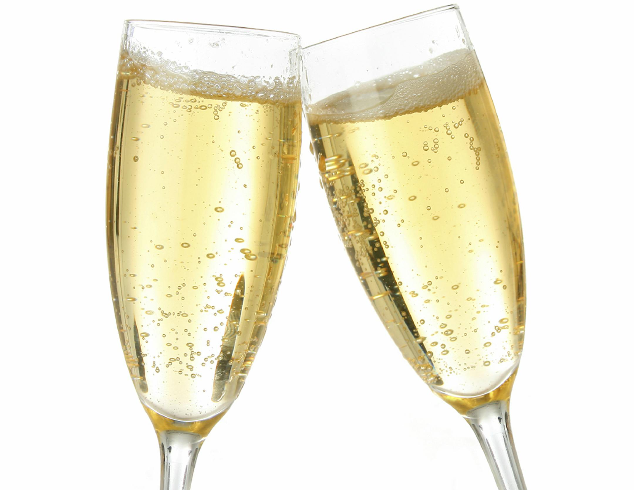 Pair of champagne flutes making a toast.