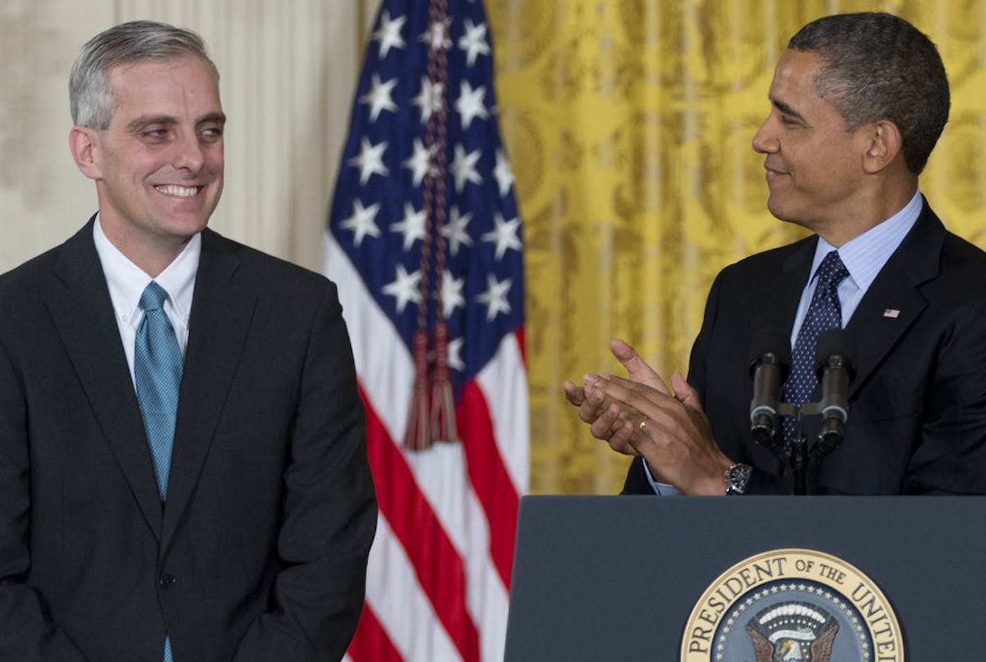 President Barack Obama announces that he will name current Deputy National Security Adviser Denis McDonough, left, as his next chief of staff, Friday, Jan. 25, 2013, in the East Room of the White House in Washington.