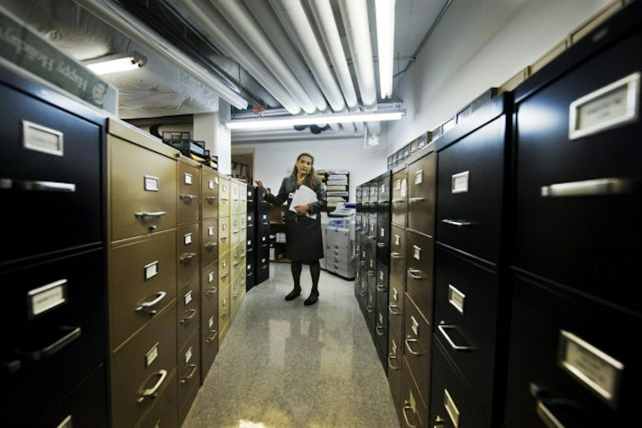 Medical examiner Dr. Lindsay Thomas shows the area where permanent records are kept. It is in an area on the other side of the hospital janitors cage separated from the rest of the morgue.