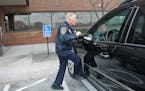 A Minnetonka officer inspected a car parked in a handicap spot.