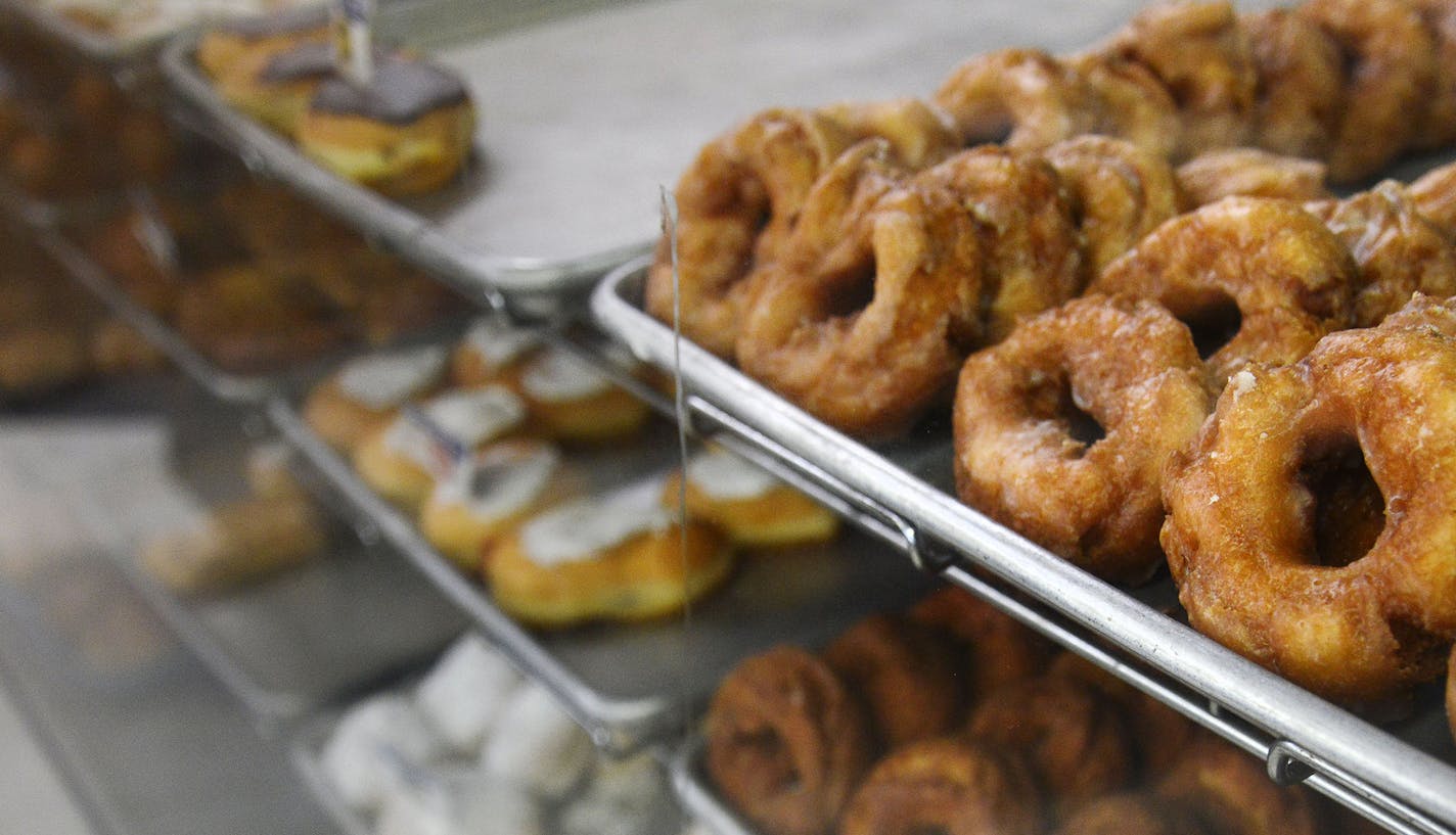 Donuts were on display at the Lindstrom Bakery in Lindstrom in the Chisago Lakes Area, Minn., on Friday June 19, 2015. The Chisago Lakes Area is made up of Chisago City, Lindstrom, Scandia, Center City, Shafer, Taylors Falls and Almelund. ] RACHEL WOOLF &#x2022; rachel.woolf@startribune.com