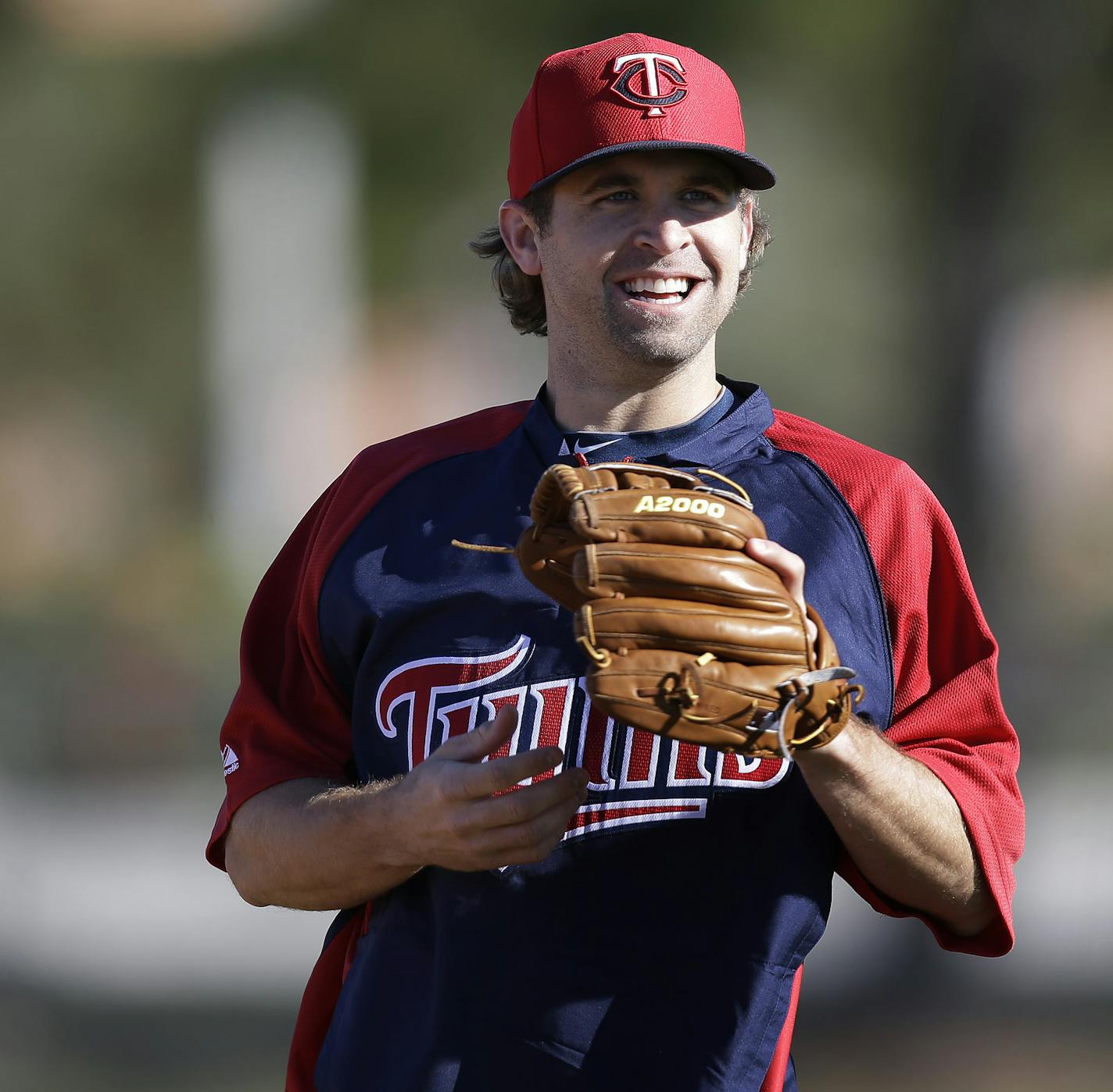 Twins infielder Brain Dozier runs through drills during practice Sunday Feb.17, 2013 at Lee County Sports Complex in Fort Myers, FL.] JERRY HOLT &#x2022; jerry.holt@startribune.com