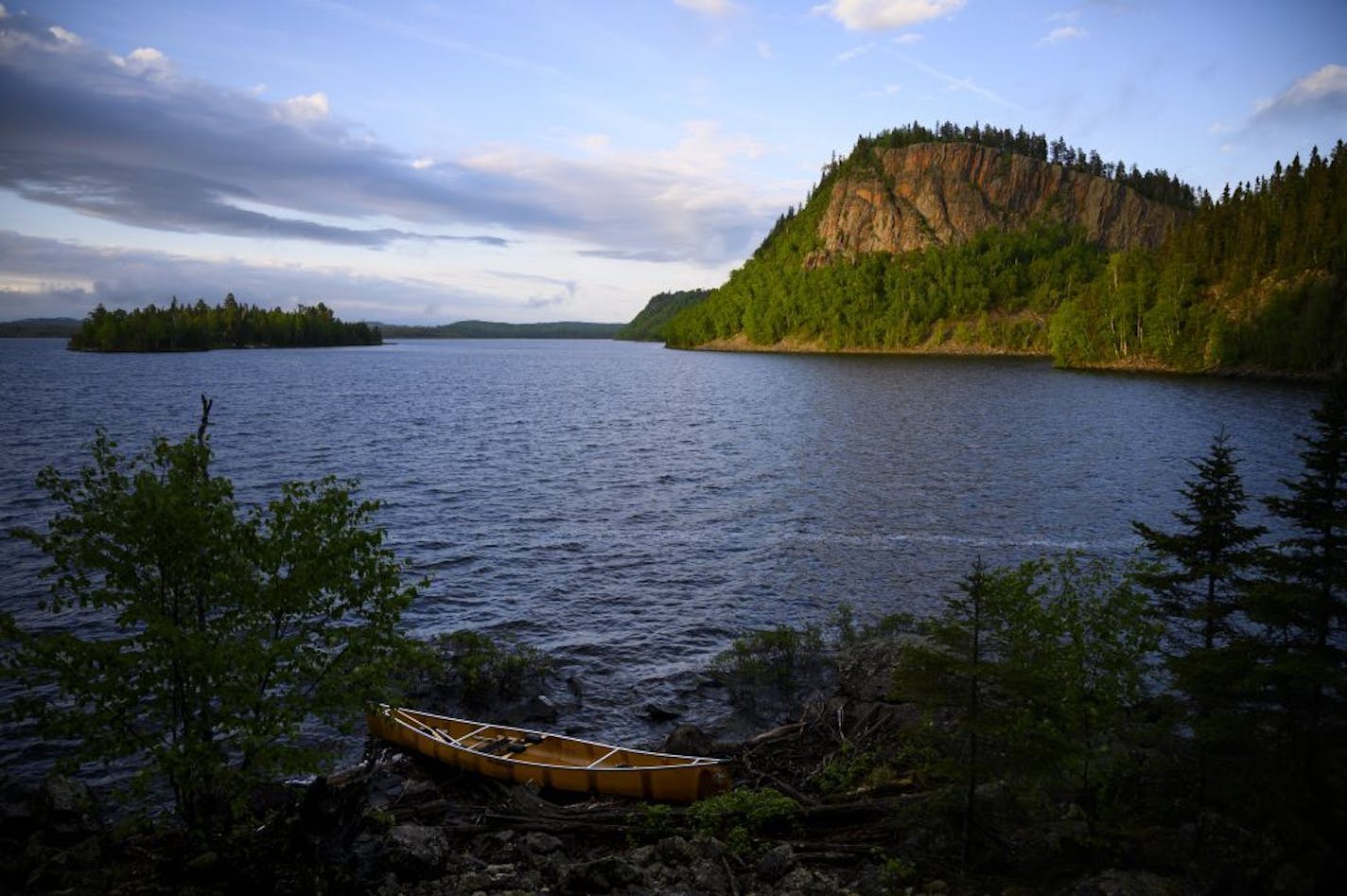 The sun illuminated a dramatic palisade on South Fowl Lake Friday night near the dam.