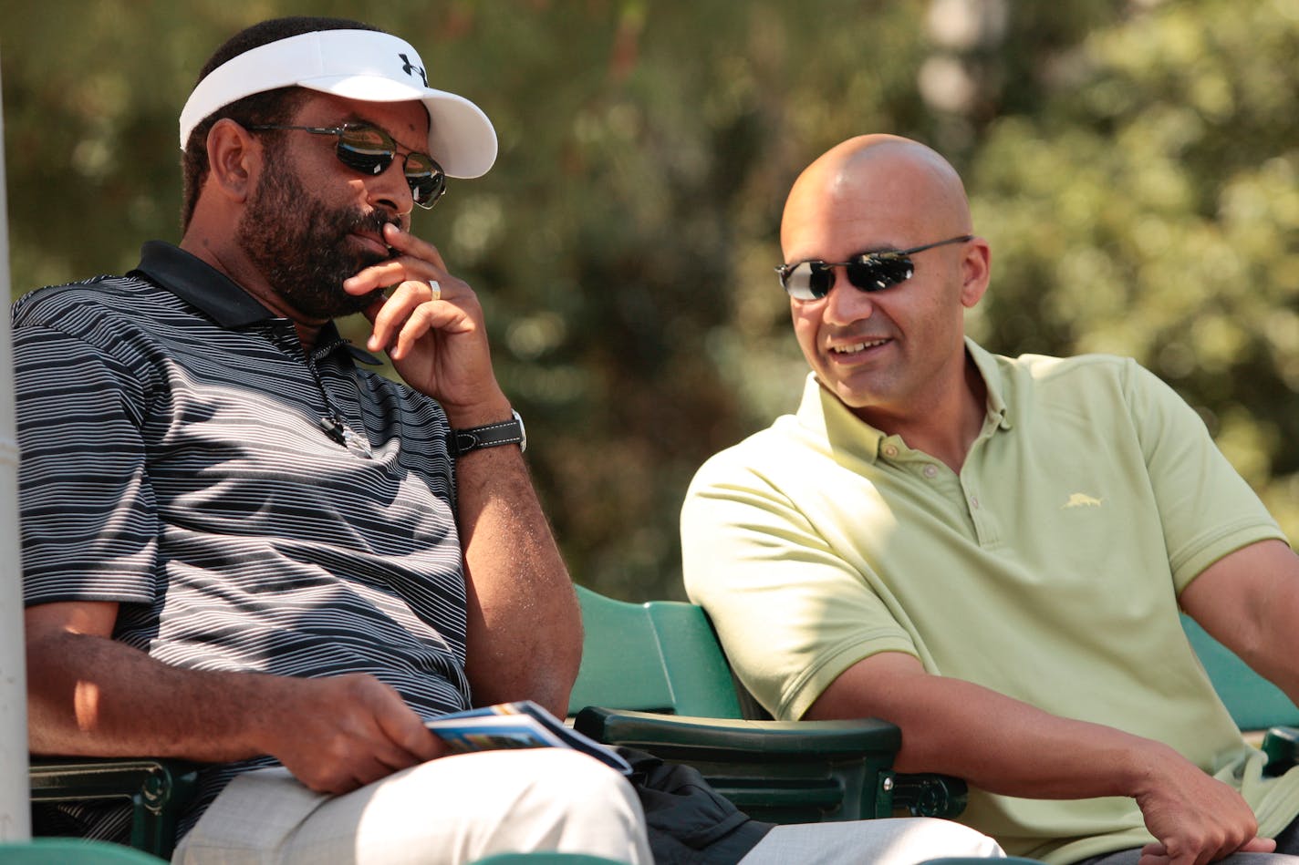 Twins scouting director Sean Johnson (right, with former Twins scouting director Deron Johnson in 2012) is preparing for a hectic signing period of prospects after a shortened five-round MLB draft.