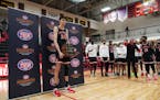 Minnehaha Academy's Chet Holmgren (34) accepted the Naismith Prep Player of the Year Award before a game at Minnehaha Academy in Minneapolis, Minn., o