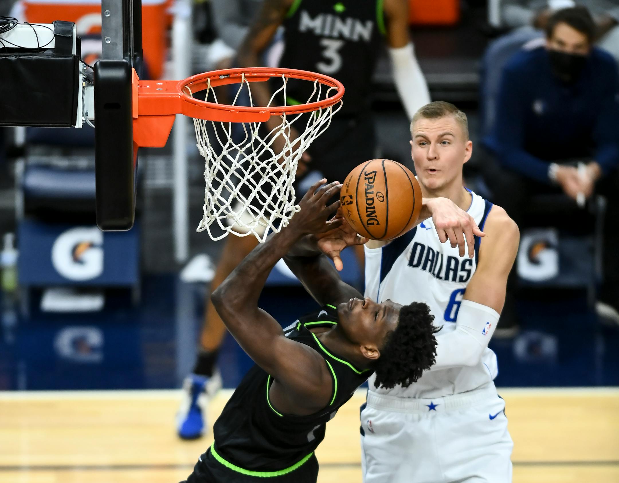 Dallas Mavericks center Kristaps Porzingis (6) blocked a shot by Minnesota Timberwolves forward Anthony Edwards (1) in the third quarter.