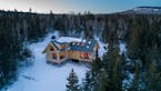 This cabin is set in a natural clearing near the Superior National Forest.