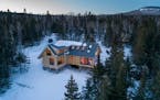 This cabin is set in a natural clearing near the Superior National Forest.