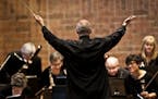 File photo: The St. Paul Chamber Orchestra conductor Thomas Zehetmair pointed to the musicians as people applauded the orchestra's return to the stage