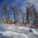 A skier made his way down the hill during the first run of Minnesota High School Alpine skiing state meet at Giants Ridge Ski Resort.