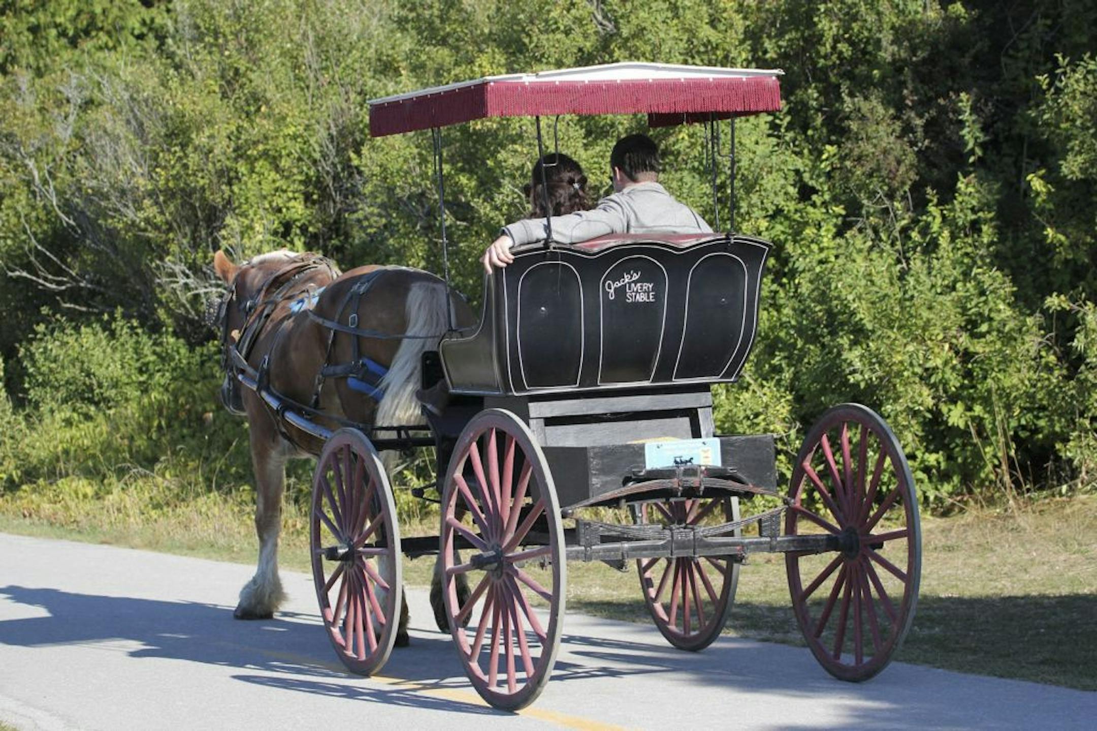 SH12F030MACKINACISLAND June 5, 2012 -- Getting your own horse and buggy is a popular way to explore Mackinac Island, where no cars are allowed.