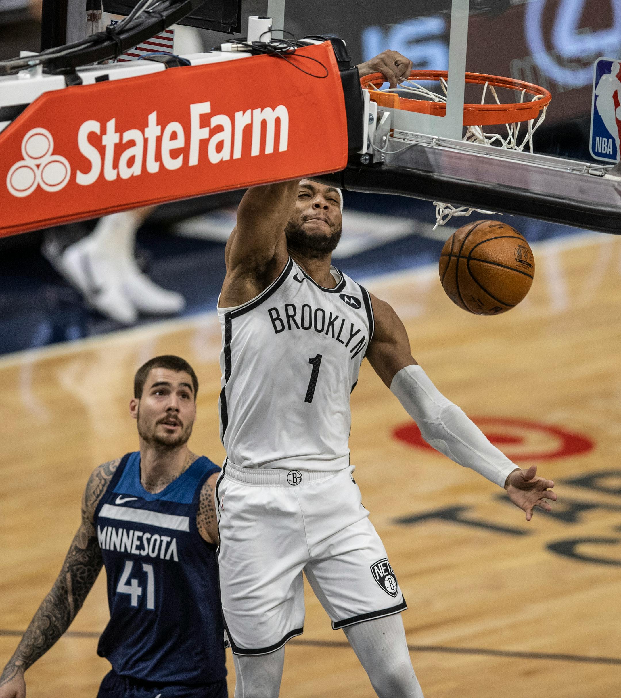 Brooklyn Nets forward Bruce Brown (1) dunked the ball over Minnesota Timberwolves forward Juancho Hernangomez (41) at Target Center on April 13, 2021 in Minneapolis.