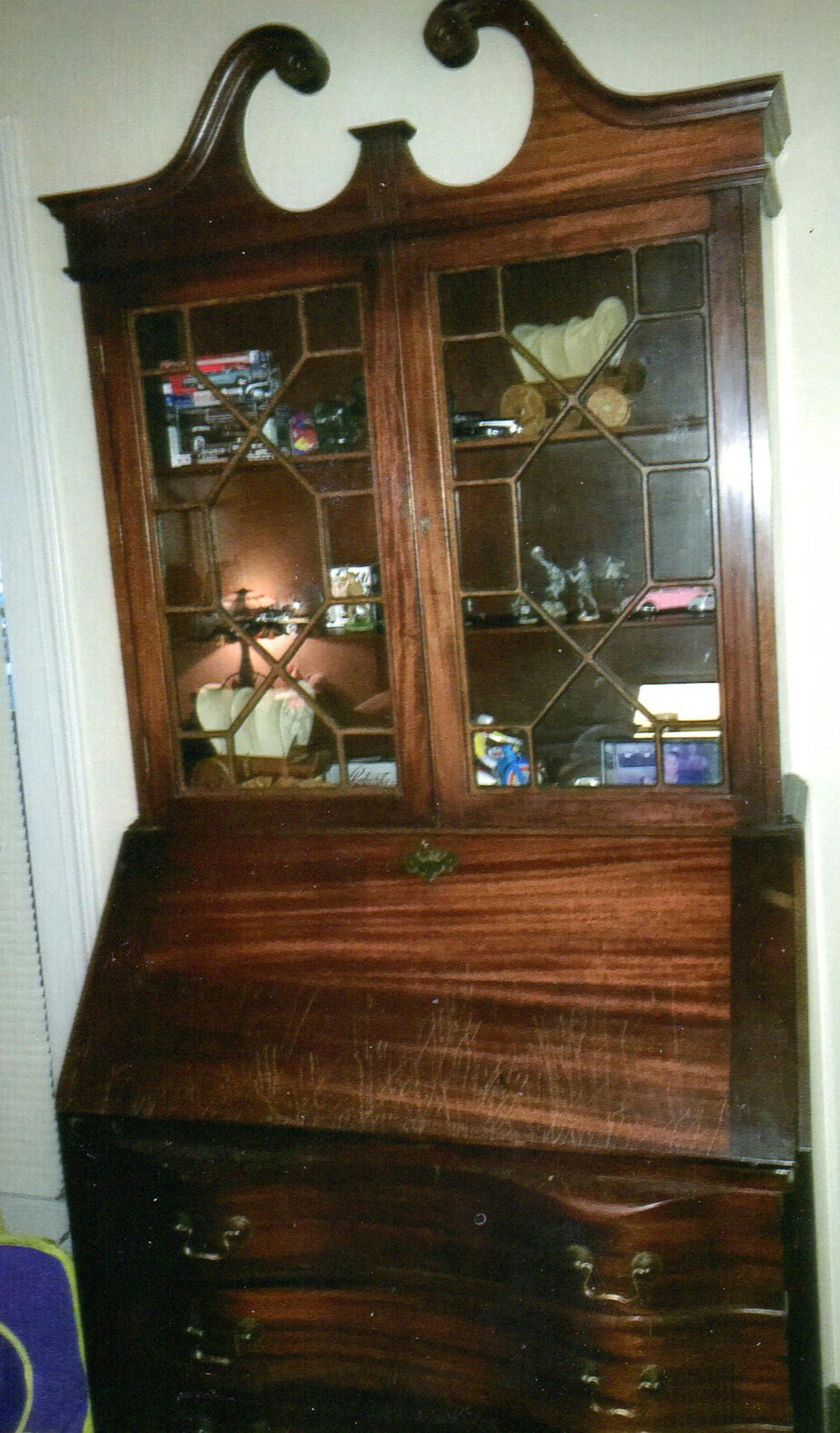 This secretary bookcase is a 20th century reproduction. (Handout/TNS)