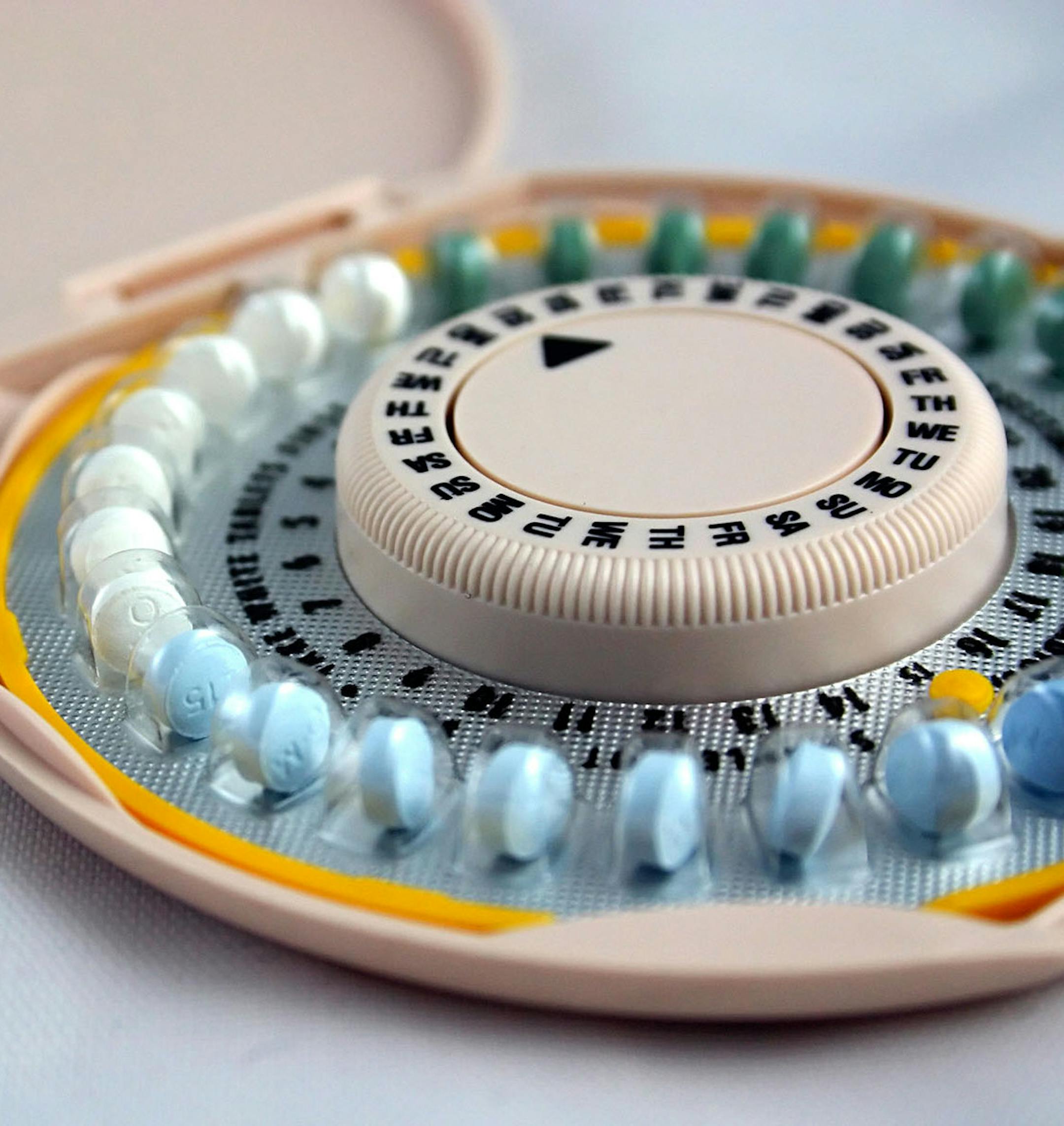 A close up of a packet of birth control pills
