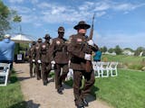 An honor guard from the Hennepin County Sheriff’s Office takes part in a 9/11 remembrance ceremony Monday, Sept. 11, 2023, at the Edinburgh USA golf