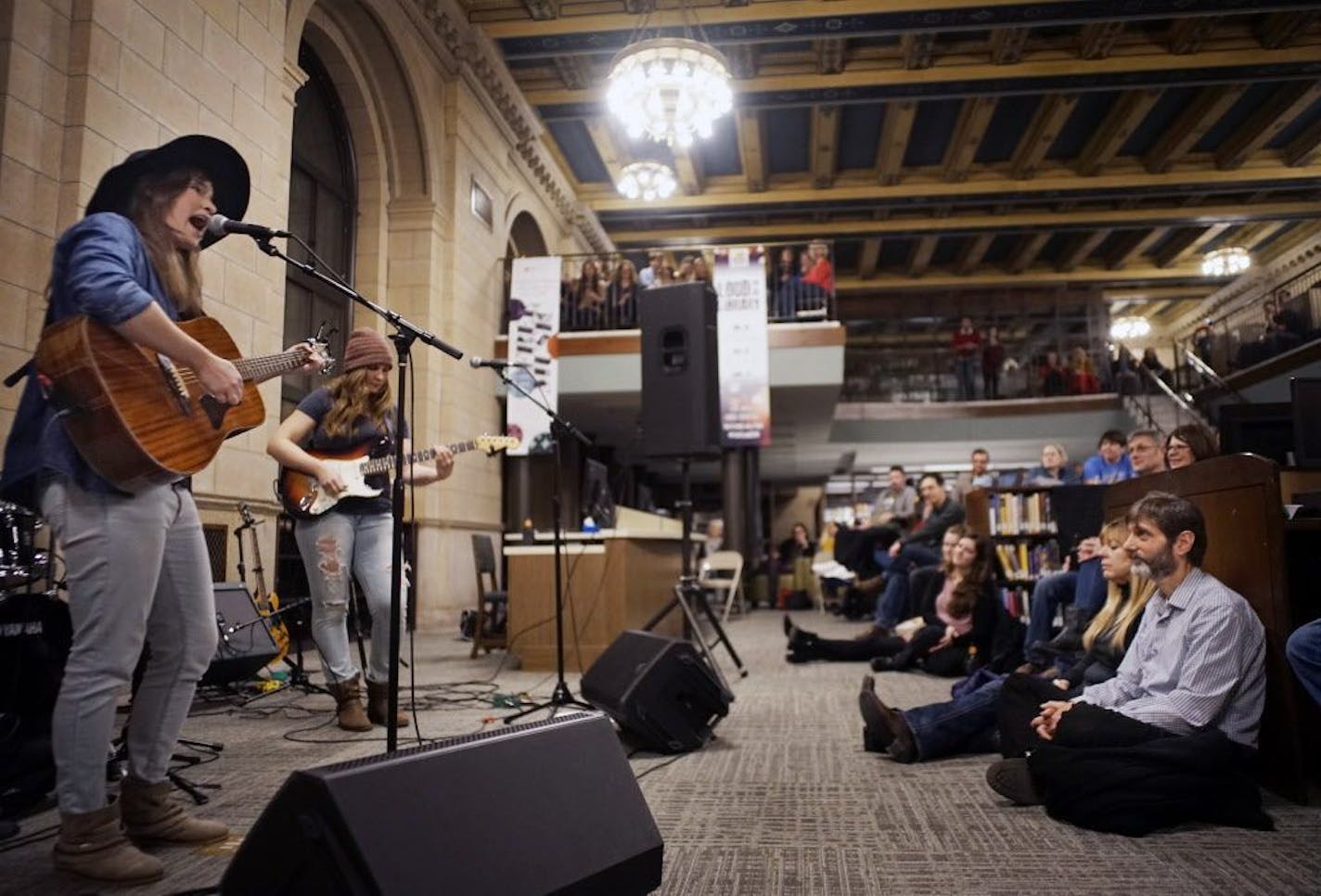 Reina del Cid played at reopening celebration Thursday night at The George Latimer Library in downtown St. Paul. It is reopening Saturday after a $1 million renovation.