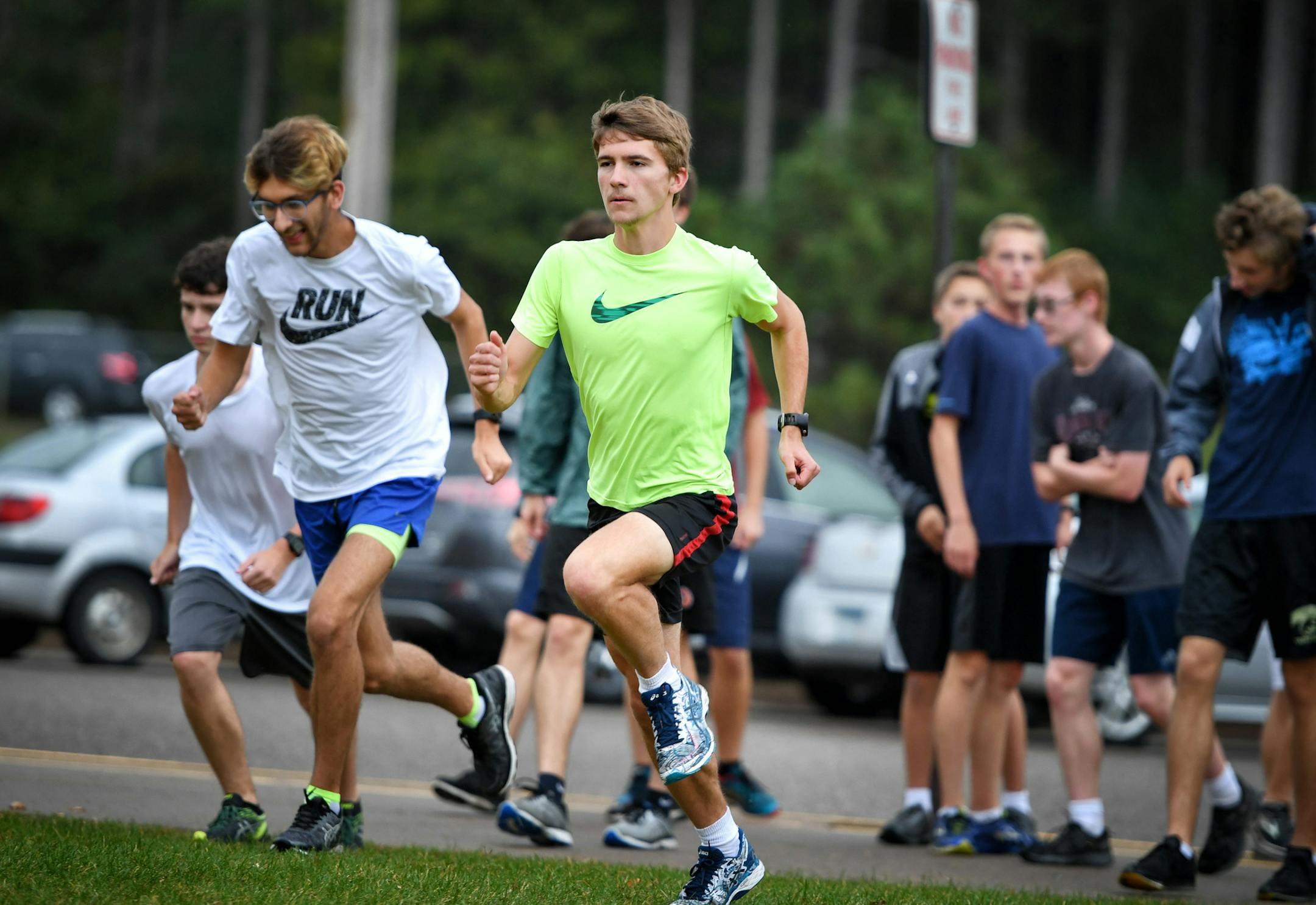 Andover senior cross-country runner Tom Breuckman during a recent practice. ] GLEN STUBBE ï glen.stubbe@startribune.com Monday, October 2, 2017 1004646229 - zone feature on Andover senior cross-country runner Tom Breuckman, raised eyebrows when he finished second at the big Milaca Mega Meet on Sept. 23. Monday practice is 2:45 to 4:30 on the Andover campus. EDS, Breuckman is wearing a dayglo yellow shirt with a Nike swoosh and black shorts with a red stripe.