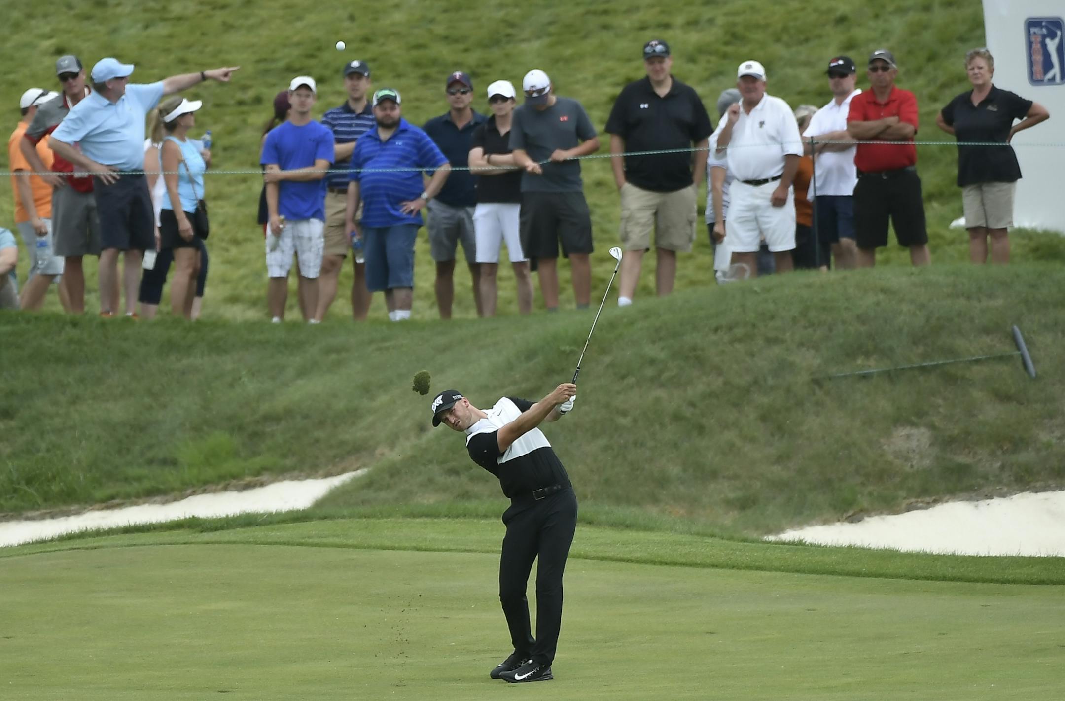 Wyndham Clark hit the ball to the eighteenth green from the fairway during the third round of the 3M Open Saturday.