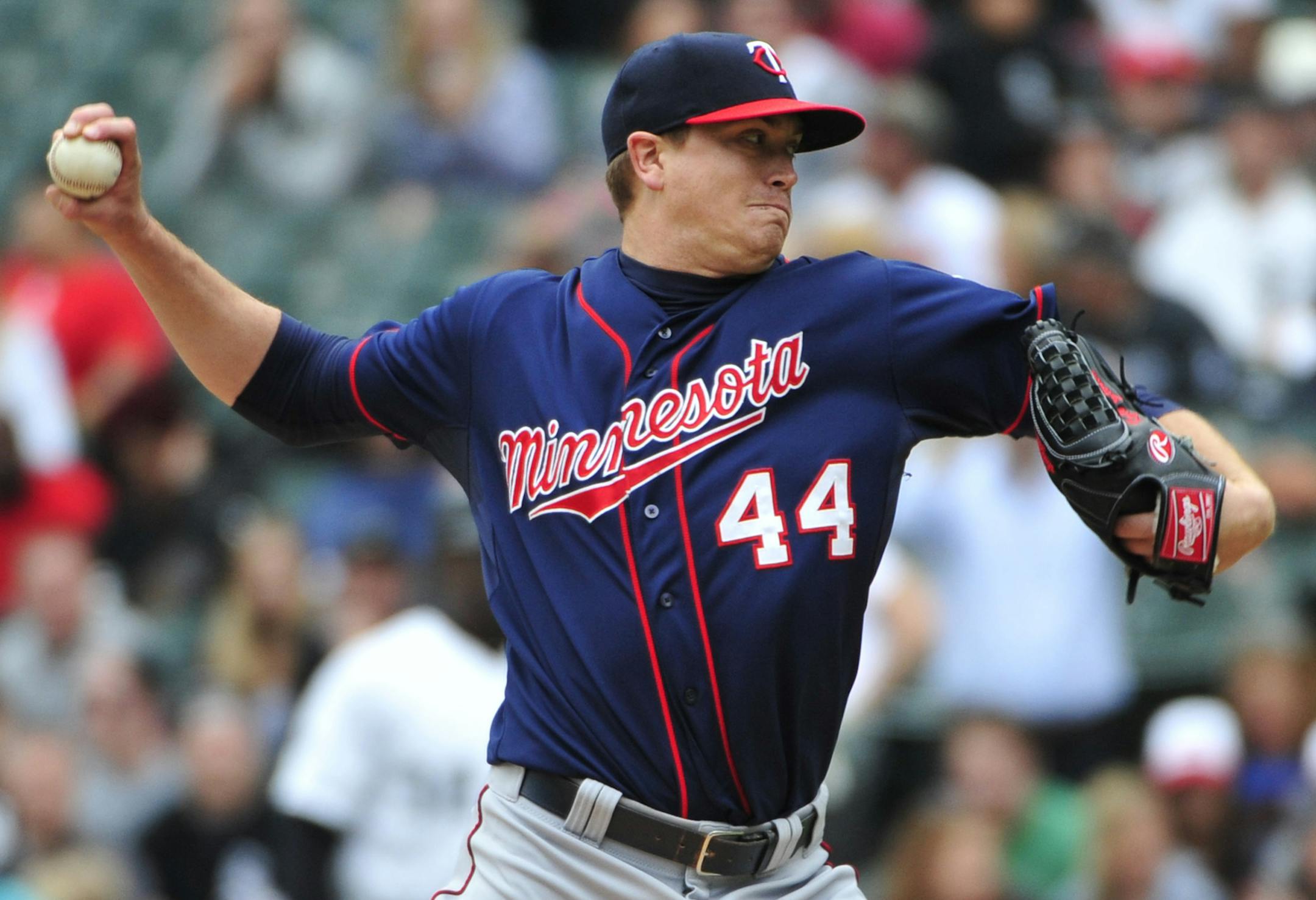 Minnesota Twins starting pitcher Kyle Gibson (44) throws against the Chicago White Sox during the seventh inning of a baseball game, Sunday, May 24, 2015 in Chicago.