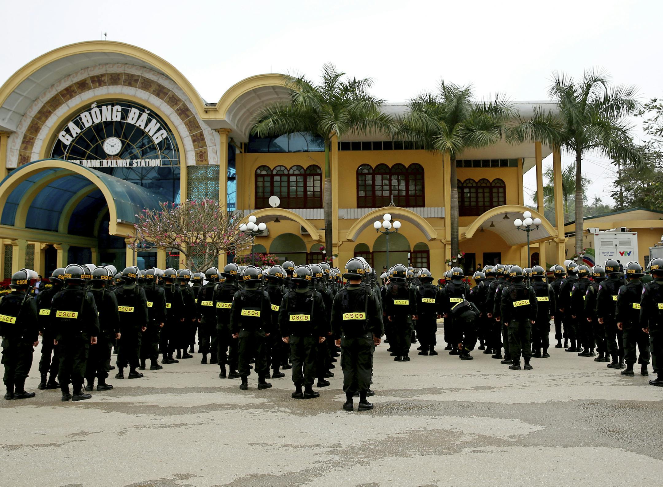 Vietnamese security stand guard at the entrance to Dong Dang train station where North Korean leader Kim Jong Un is expected to arrive at the border town with China, in Dong Dang, Vietnam, Monday, Feb. 25, 2019. With North Korean leader Kim Jong Un on an armored train barreling through China toward Vietnam's capital, and U.S. President Donald Trump about to board a jet for Hanoi, Vietnamese officials scrambled Monday to finish preparations for a rushed summit that will capture global attention.