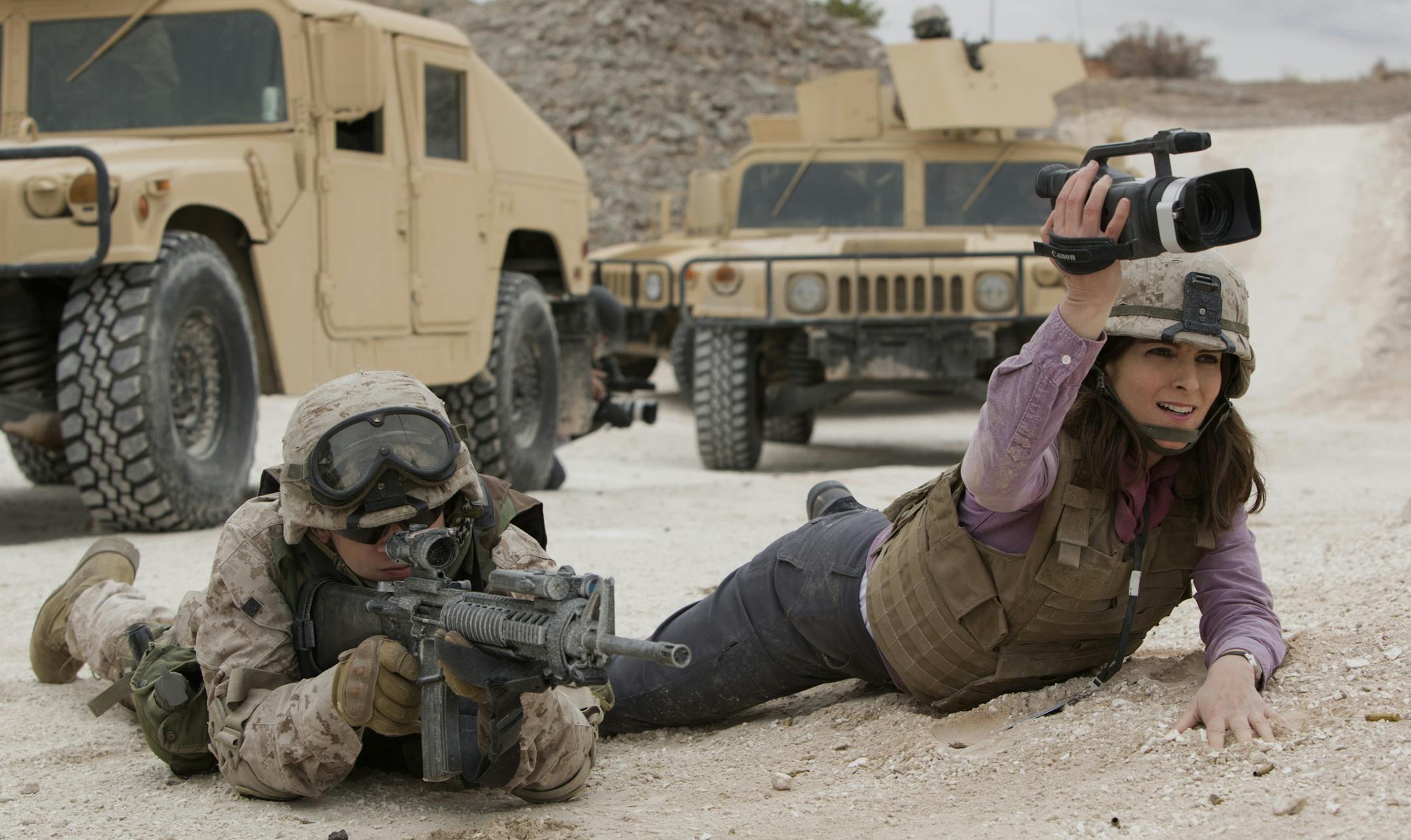 Left to right: Evan Jonigkeit plays Specialist Coughlin and Tina Fey plays Kim Baker in Whiskey Tango Foxtrot from Paramount Pictures and Broadway Video/Little Stranger Productions in theatres March 4, 2016.
