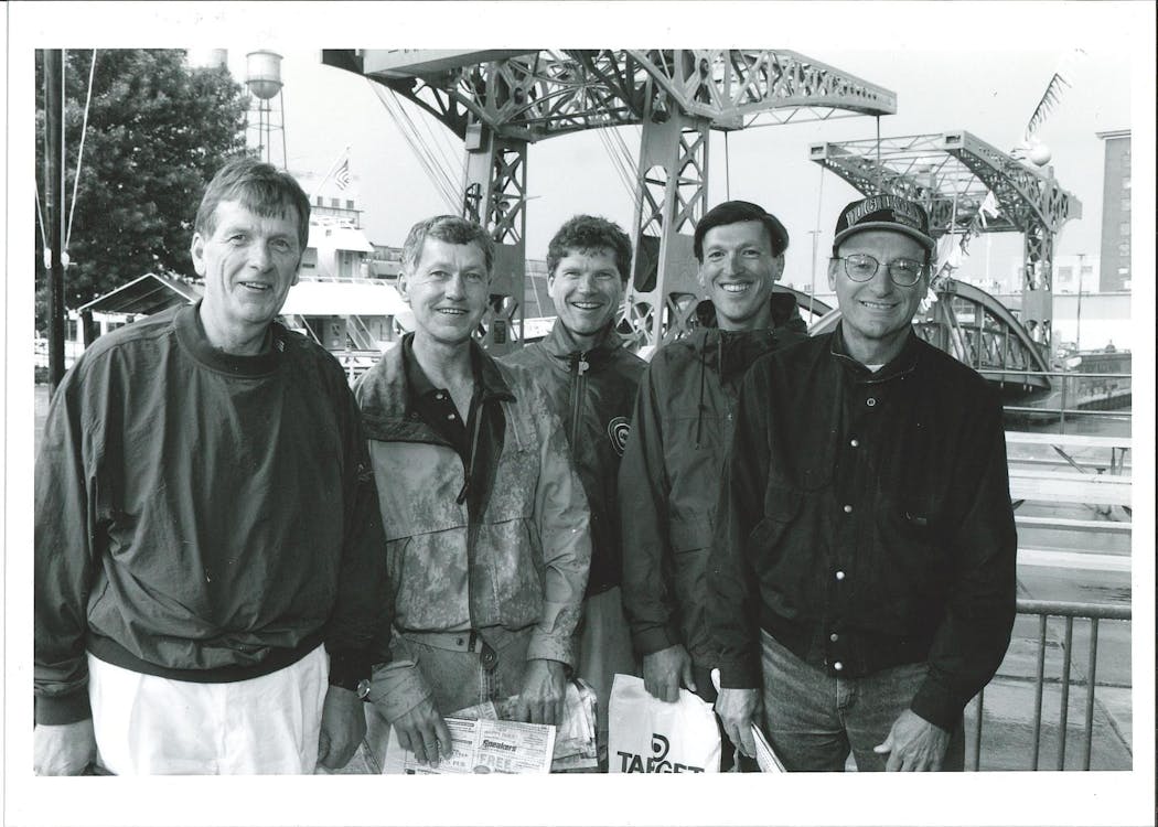 The five Glatzmaier brothers, who ran Grandma's Marathon in Duluth in 1998, in front of the Minnesota Slip Bridge. They are, from left to right: Tom, Jerry, Jim, Dick and Joe.