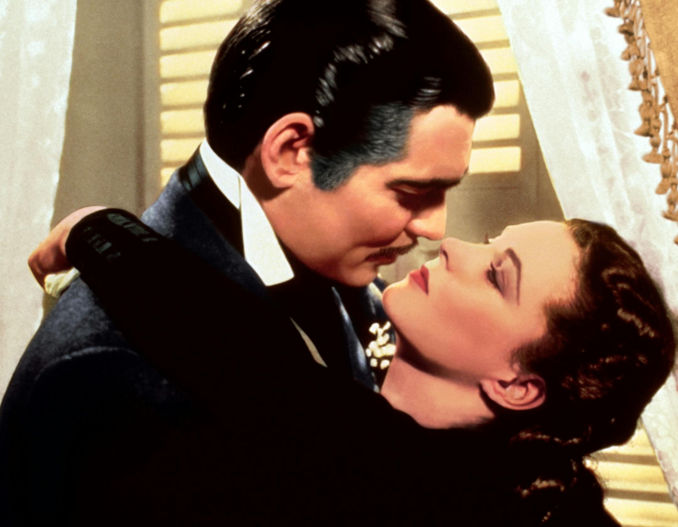 This image released by Turner Classic Movies shows Clark Gable, left, and Vivien Leigh in a scene from "Gone with the Wind." On Thursday, the TCM Classic Film Festival will open its 10th annual edition in Los Angeles with “When Harry Met Sally...” To mark its anniversary, TCM will on Sunday again air “Gone With the Wind,” the film that it first transmitted on April 14, 1994. (Turner Classic Movies via AP)
