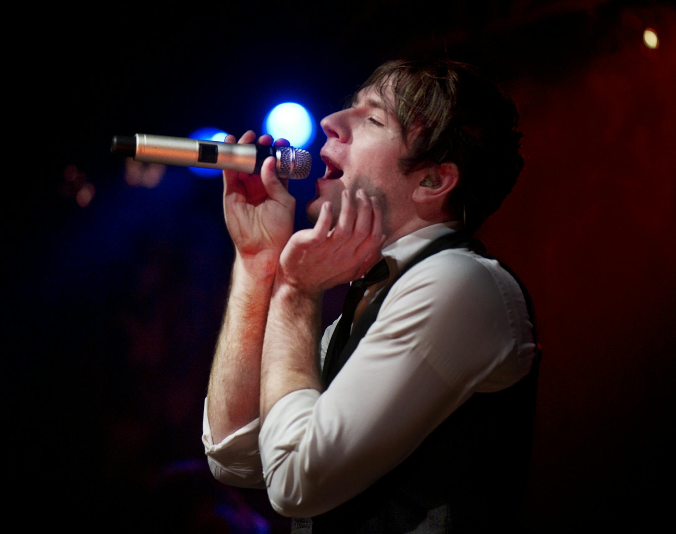 Adam Young in performance at an Owl City benefit concert in Owatonna.