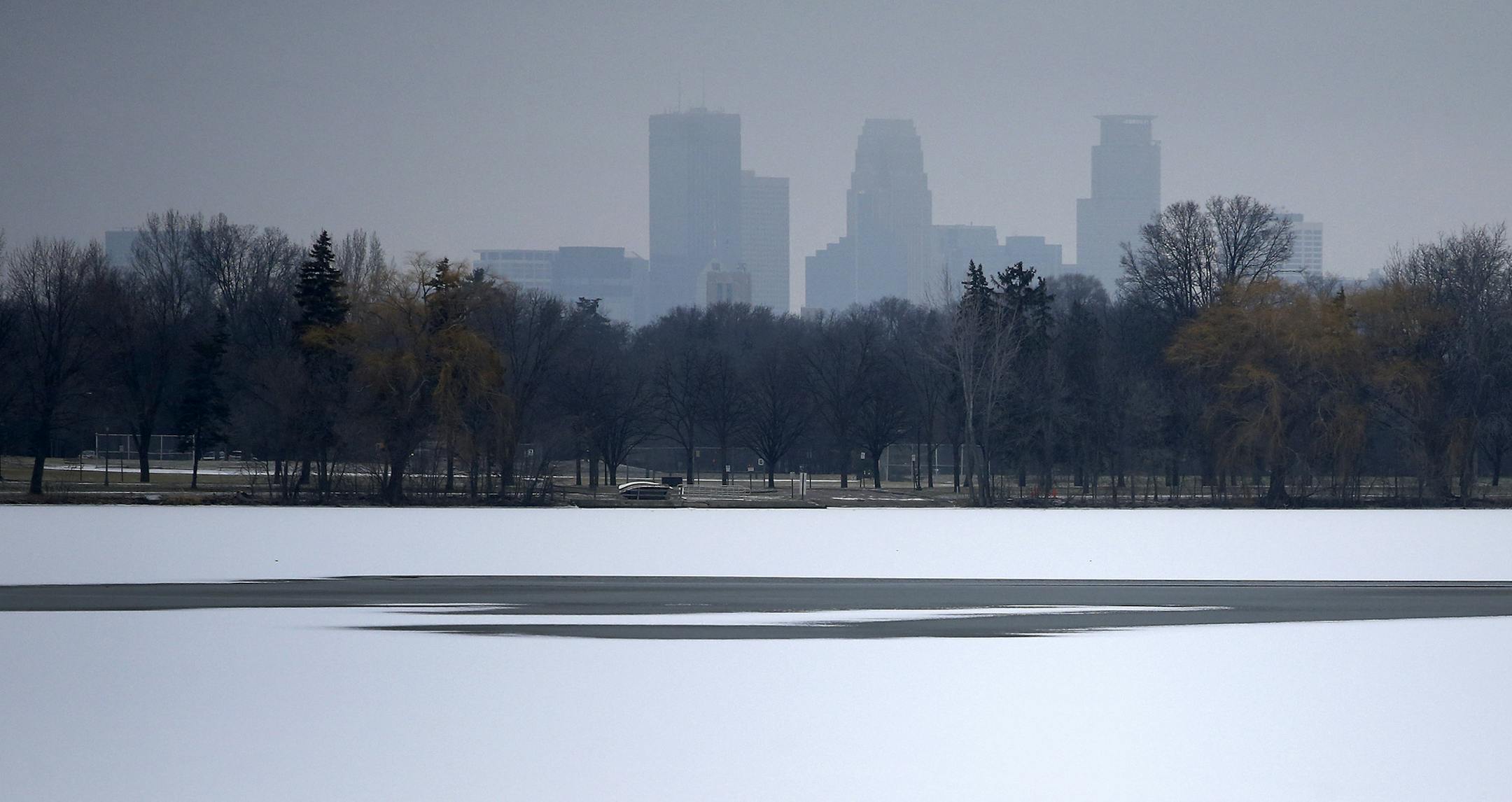 Lake Nokomis in Minneapolis on Tuesday afternoon. The unseasonably warm weather in the State of Hockey has forced the U.S. pond hockey championship organizers to reschedule the event on Lake Nokomis because they fear the ice won't be safe for skating. ] CARLOS GONZALEZ ï cgonzalez@startribune.com - December 22, 2015, Minneapolis, MN, Lake Nokomis, Pond Hockey Championships pushed back because of warm weather.