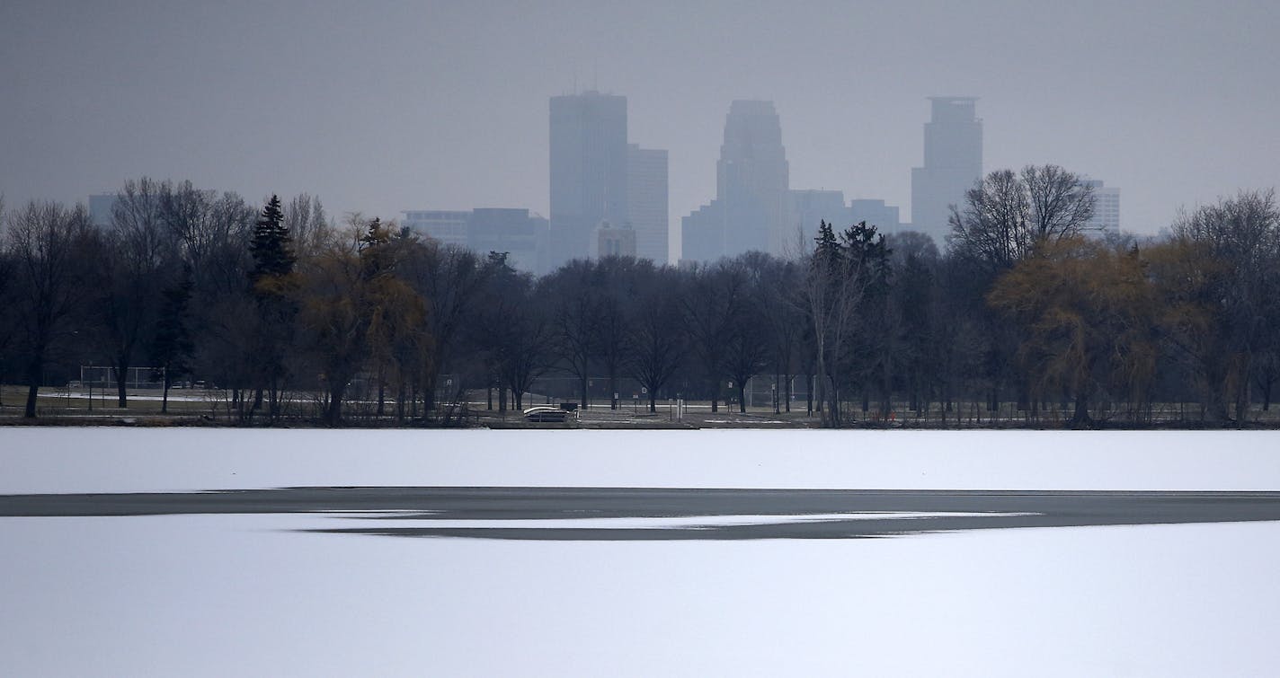 Lake Nokomis in Minneapolis on Tuesday afternoon. The unseasonably warm weather in the State of Hockey has forced the U.S. pond hockey championship organizers to reschedule the event on Lake Nokomis because they fear the ice won't be safe for skating. ] CARLOS GONZALEZ &#xef; cgonzalez@startribune.com - December 22, 2015, Minneapolis, MN, Lake Nokomis, Pond Hockey Championships pushed back because of warm weather.