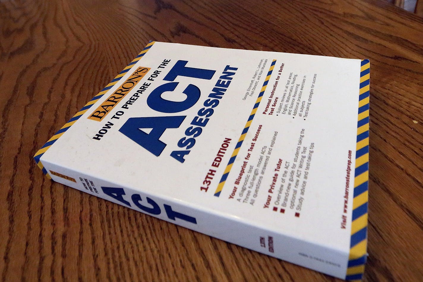 An ACT exam preparation book is seen in Springfield, Ill., in this photo from April 2014.