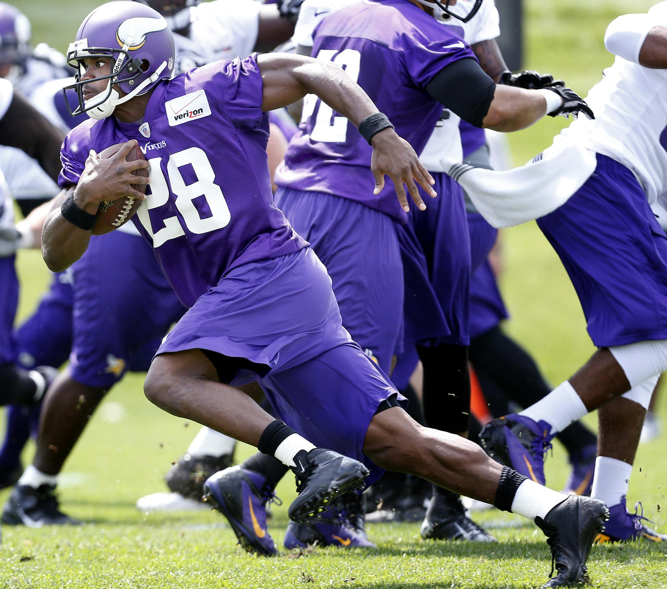 Minnesota Vikings running back Adrian Peterson (28) during practice on Tuesday. ] CARLOS GONZALEZ cgonzalez@startribune.com June 18, 2013, Eden Prairie, Minn., Winter Park, Minnesota Vikings minicamp