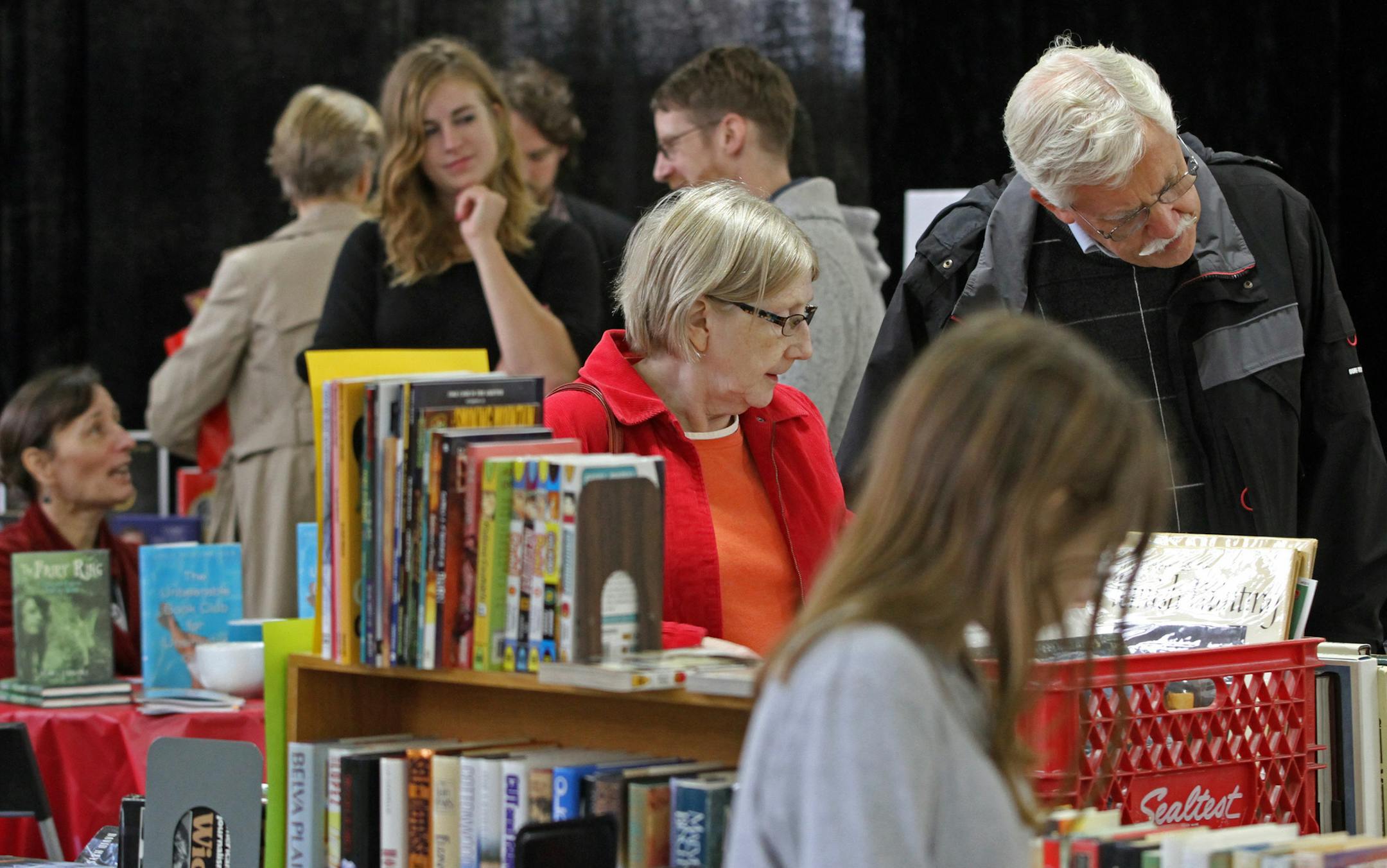 Thousands of people browsed through rows and rows of books at the 12th annual Twin Cities Book Festival, October 13, 2012, at the Historic Progress Center at the Minnesota State Fairgrounds. The festival's included readings from world-renowned authors, panel discussions, children's events, and book exhibitors.] Bruce Bisping/Star Tribune bbisping@startribune.com