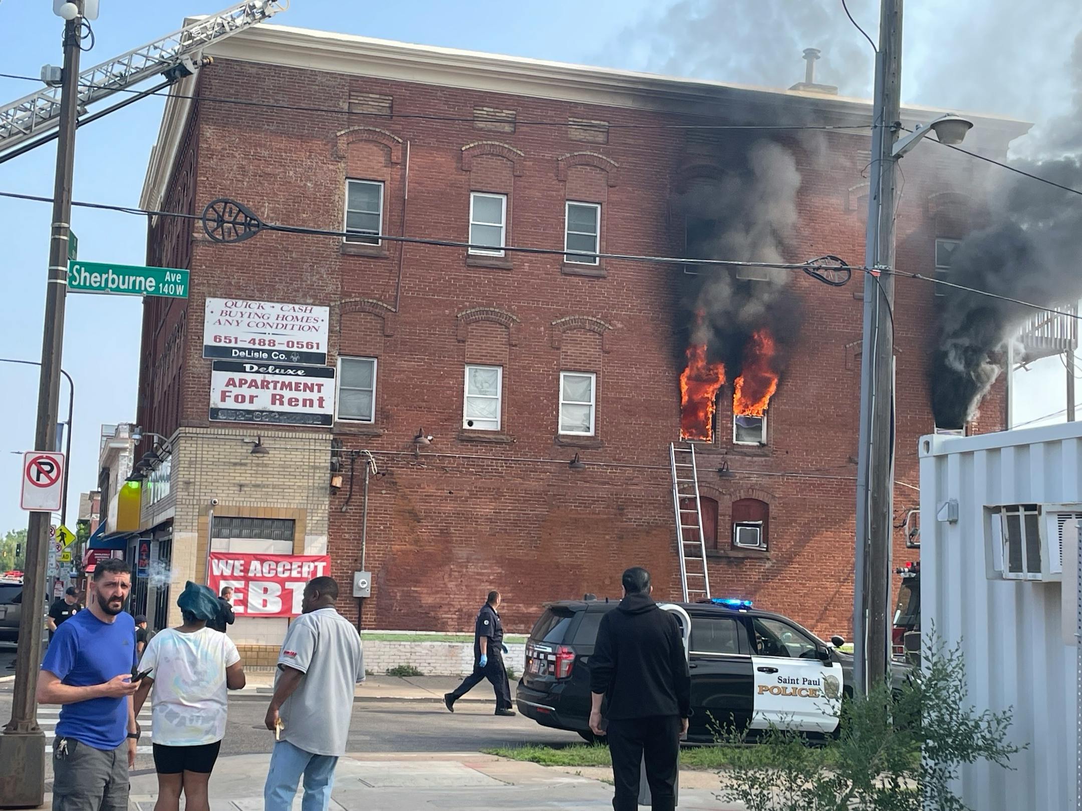 Fire torches a three story apartment building in St. Paul, where 14 residents were displaced and three people were hospitalized with minor injuries.