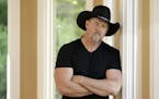 In this May 13, 2013 photo, country singer Trace Adkins and Maureen Maltez rehearse in Brentwood, Tenn. Atkins recently heard Maltez sing at his daugh