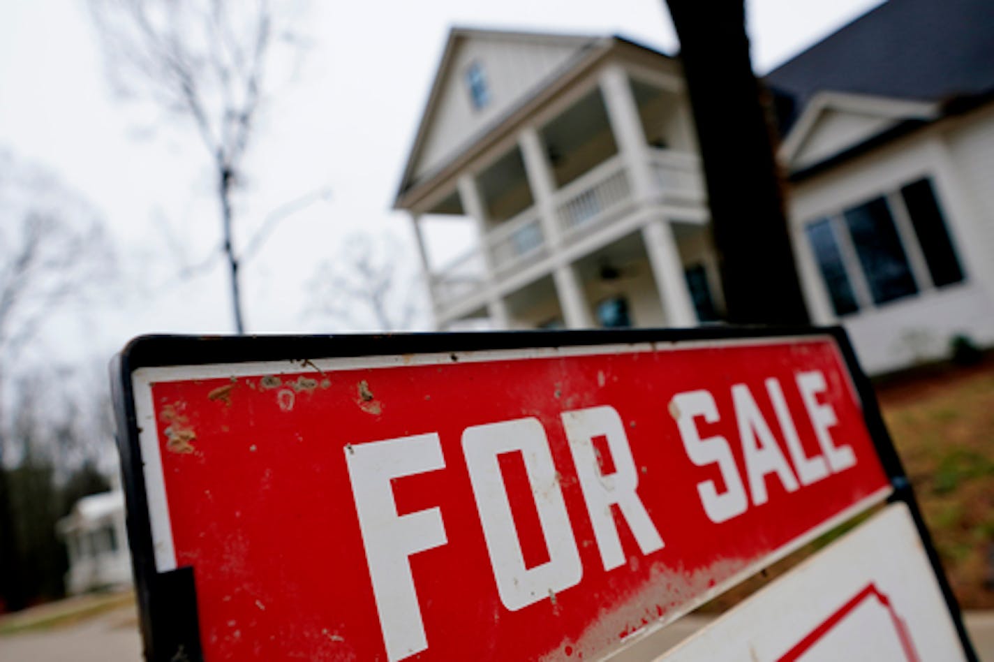 FILE - In this Thursday, Feb. 18, 2021, file photo, a new home is for sale in Madison, Ga. Mortgage buyer Freddie Mac reported Thursday, July 14, 2022, that the 30-year rate rose to 5.51% from 5.30% last week, just as the latest government data shows inflation has not slowed, meaning the Federal Reserve is almost certain to raise its benchmark borrowing rate again. (AP Photo/John Bazemore, File)