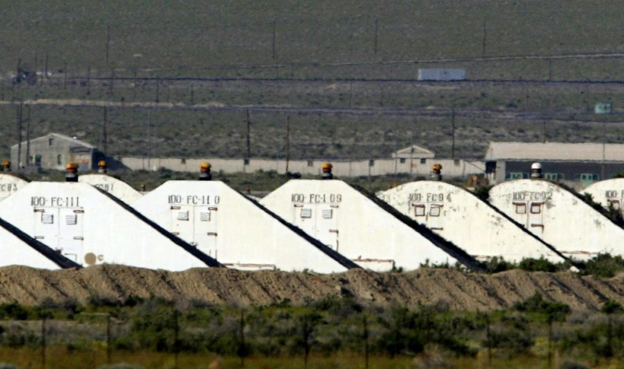 FILE - This May 20, 2005 file photo shows storage bunkers at the U.S. Army Depot in Hawthorne, Nev. Seven Marines from a North Carolina unit were killed and several injured in a training accident at the Hawthorne Army Depot, the Marine Corps said Tuesday, March 19, 2013. The cause of the accident, that occurred shortly before 10 p.m. PST, Monday, March 18, is under investigation, officials said in a statement from the 2nd Marine Expeditionary Force at Camp LeJeune, N.C. The Hawthorne Army Depot