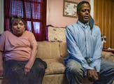 Seen in 2021, Andre Moore, right, said he suffers PTSD from treatment at the hands of cops who targeted him with trumped-up felony drug charges. He’
