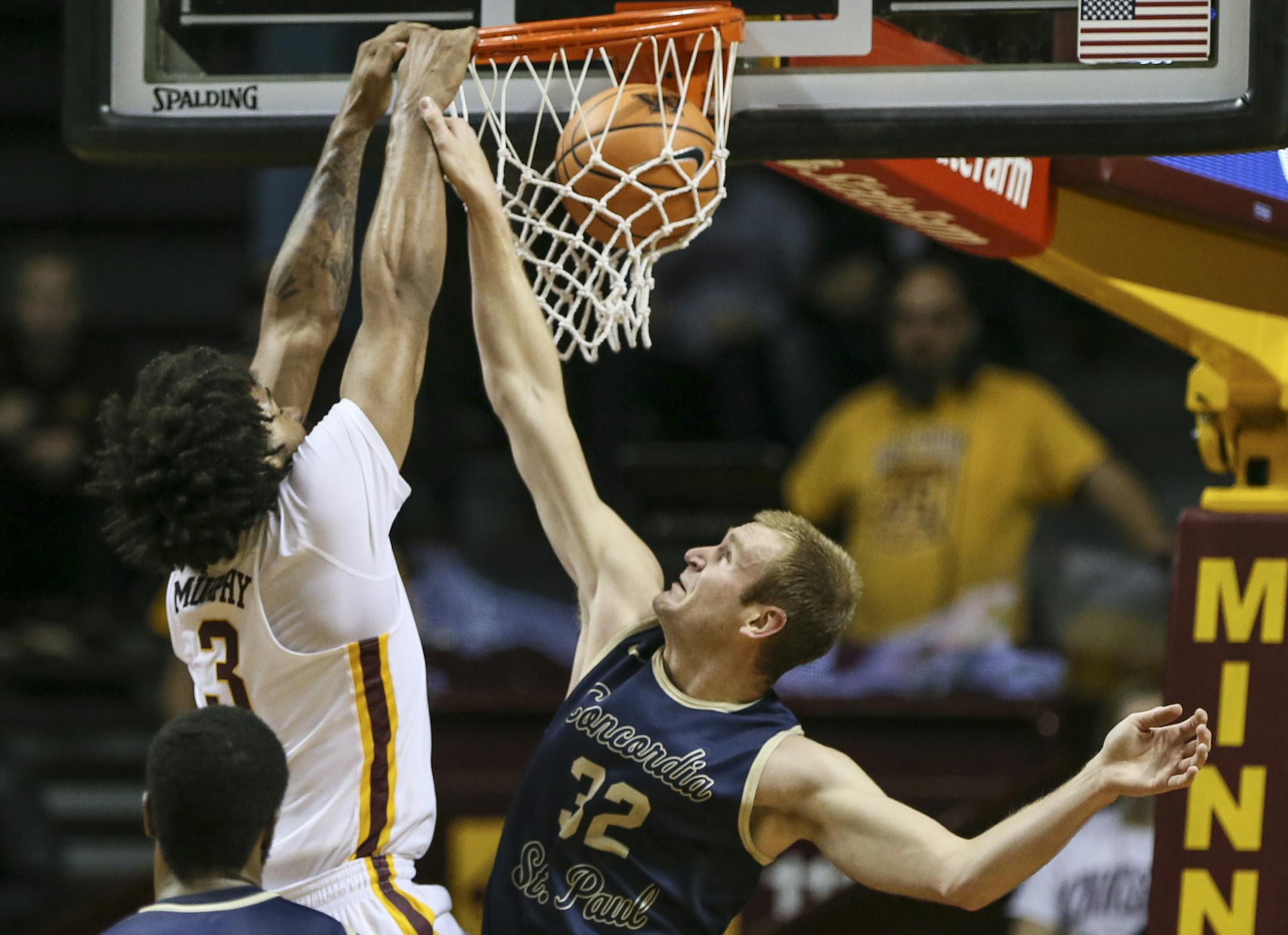 Minnesota's Jordan Murphy (3) dunked the ball during the first half as Concordia's Max Keefe (32) tried to stop him. ] RENEE JONES SCHNEIDER • renee.jones@startribune.com The Gophers hosted Concordia St. Paul for an exhibition game on November 2, 2017, at Williams Arena in Minneapolis, Minn.