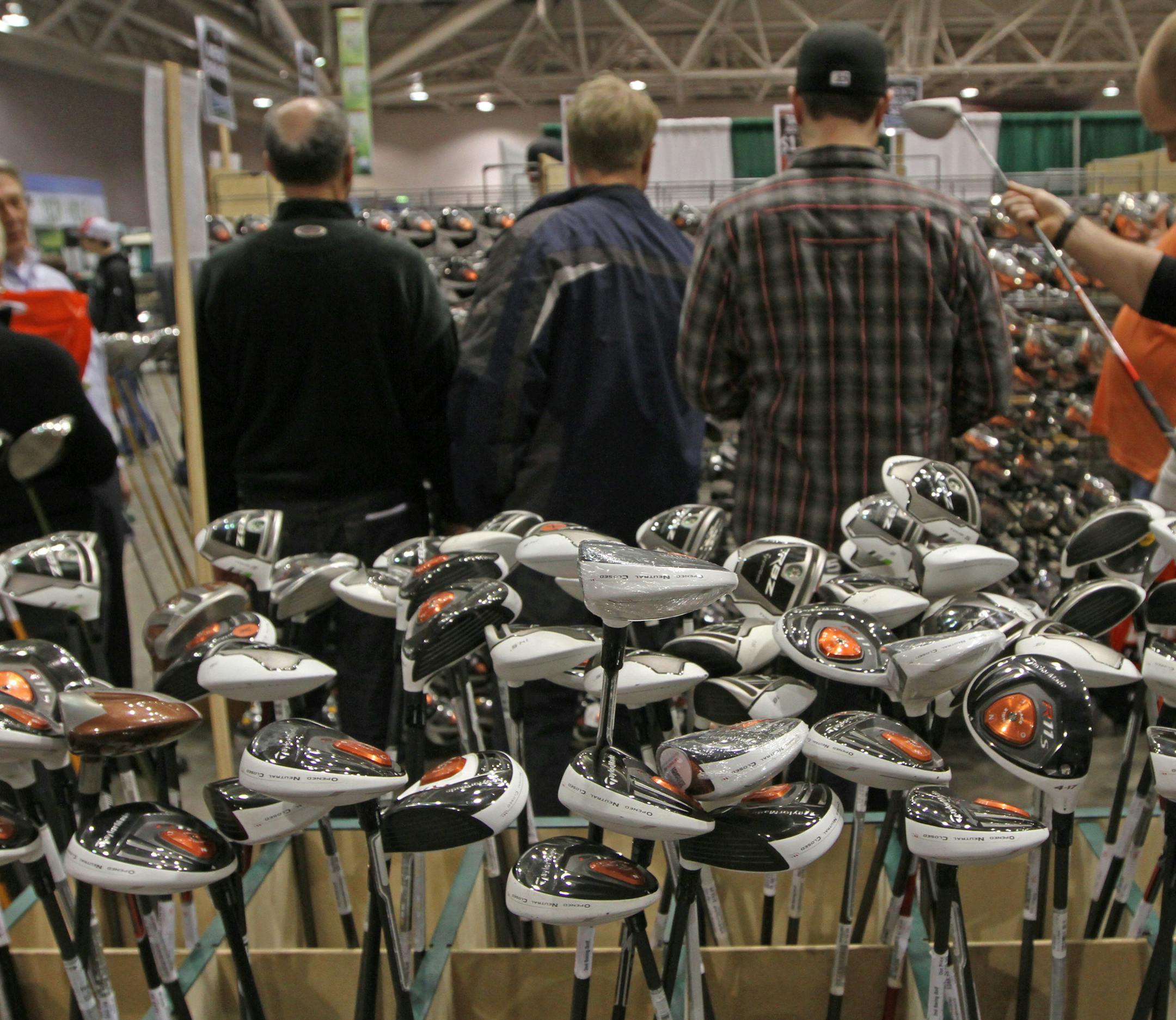 Thousands of the latest golf clubs were on display during the Minnesota Golf Show at the Minneapolis Convention Center on 2/16/13. The show features the latest in golf technology, equipment, driving range and a $100,000 Long Putt Challenge. The show runs through Sunday.] Bruce Bisping/Star Tribune bbisping@startribune.com
