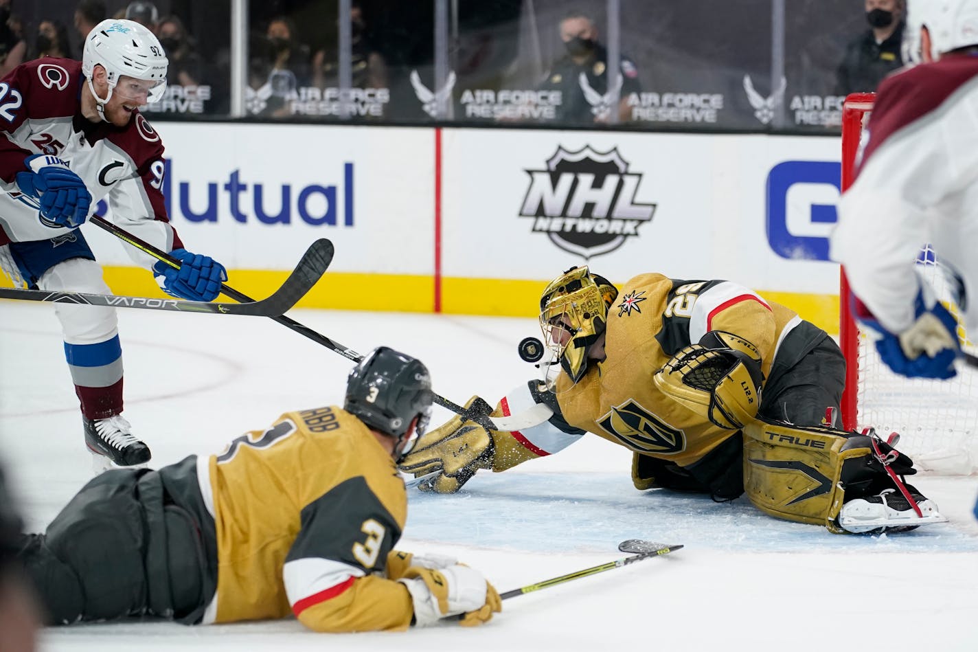 Vegas Golden Knights goaltender Marc-Andre Fleury (29) blocks a shot by Colorado Avalanche left wing Gabriel Landeskog (92) during the first period of an NHL hockey game Wednesday, April 28, 2021, in Las Vegas. (AP Photo/John Locher) ORG XMIT: NVJL102