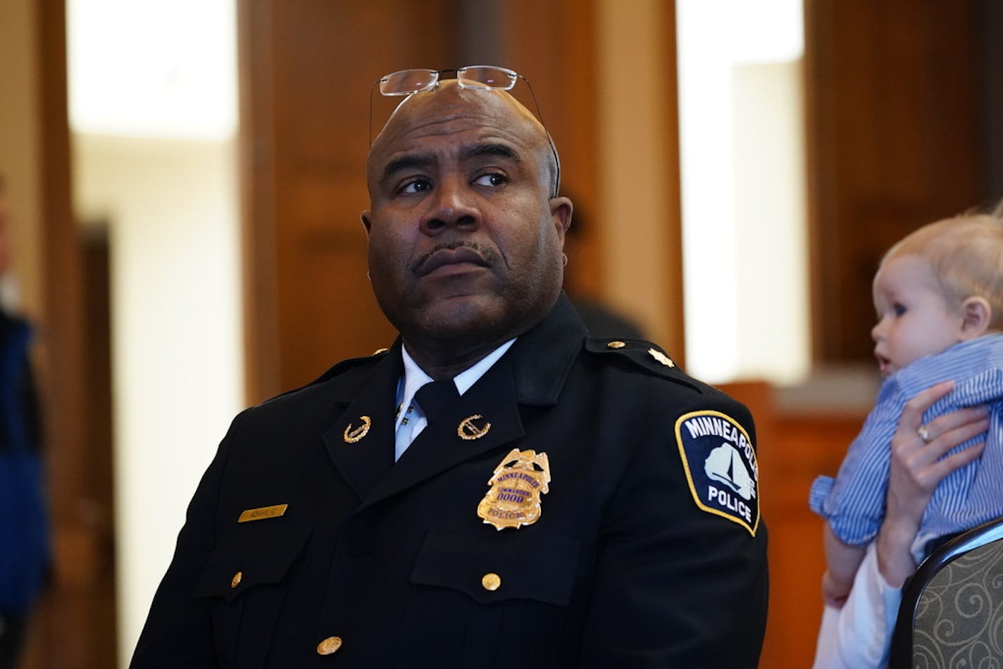 The signees include some of the most prominent and respected officers, including Cmdr. Charlie Adams, who now runs the department's community engagement efforts.