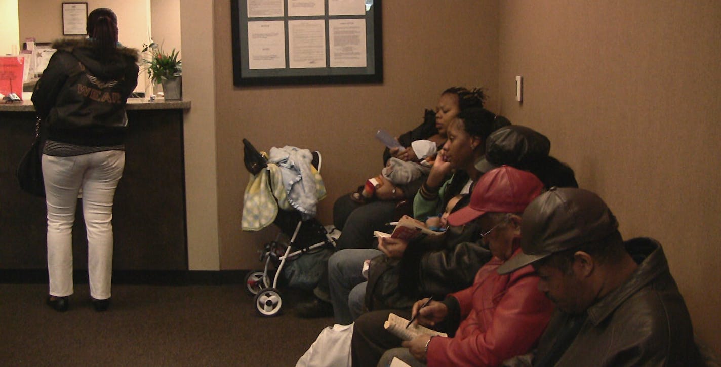 In this image taken from video, patients fill almost all the chairs of a waiting room at the Southside Medical Center in Atlanta March 4, 2009. Community health centers across the country are experiencing larger caseloads due to the economic downturn. (AP Photo/Johnny Clark) ORG XMIT: AX203