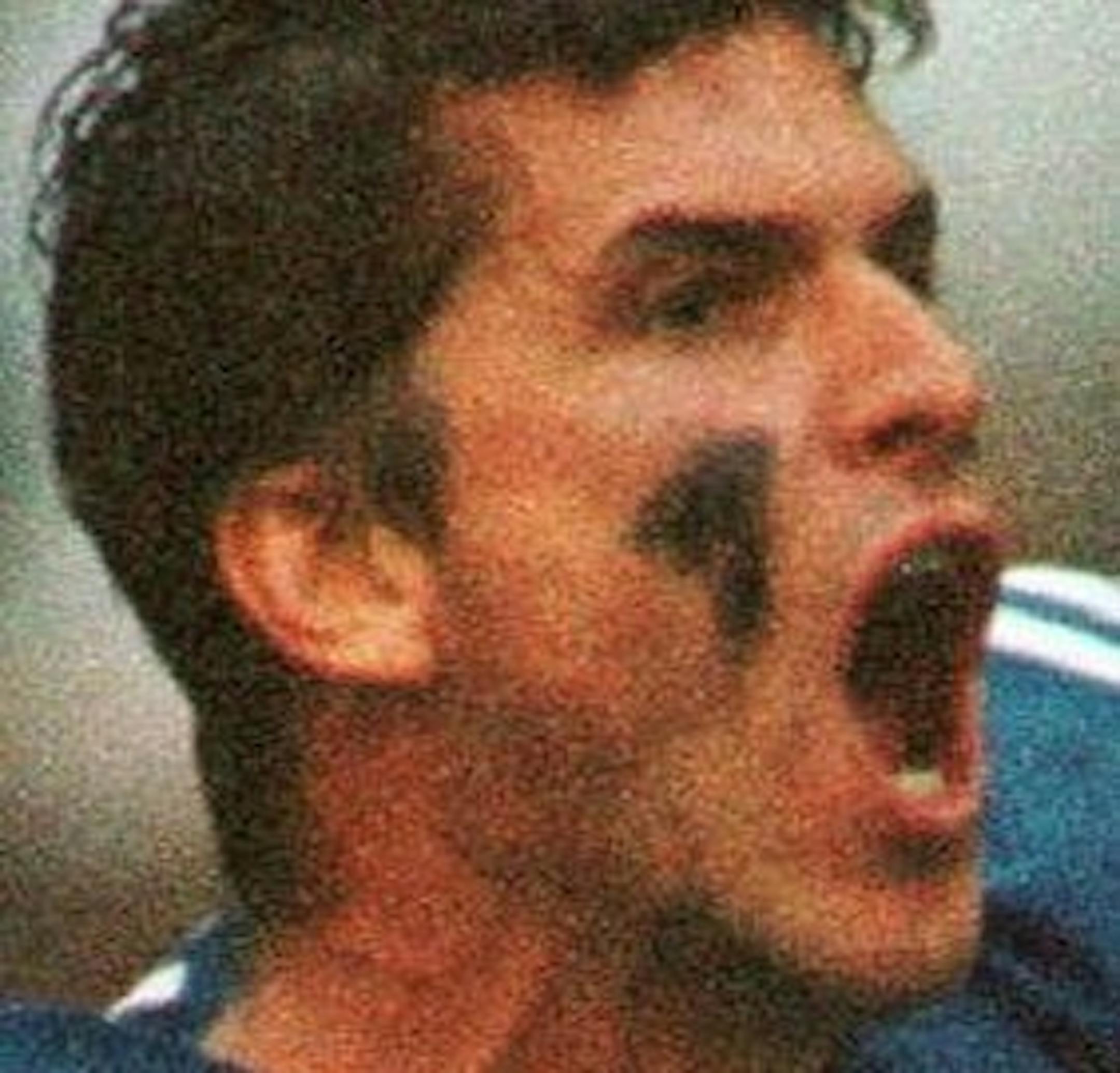 Indianapolis Colts quarterback Jim Harbaugh (4) celebrates with teammate Ray Buchanan (34) after a last-second field goal attempt by the Dallas Cowboys hit the cross-bar, Sunday, Sept. 15, 1996. The Colts beat the Cowboys 25-24, in Irving, Texas. (AP Photo/Tim Fitzgerald) ORG XMIT: IRV111